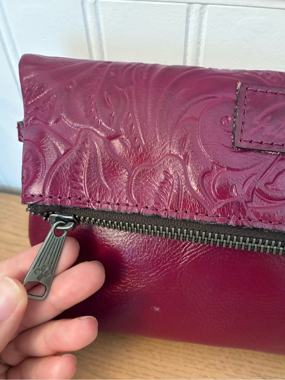 Patricia Nash Valerie fold-over wristlet in cranberry tooled leather - Picture 6 of 10